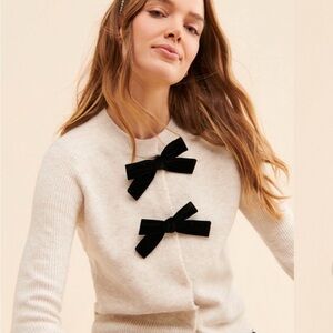 Anthropologie Cream Cardigan with Black Bow Details